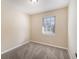 Bright bedroom featuring neutral walls and carpet at 2751 Lloyd Rd, Decatur, GA 30034