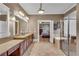 Elegant bathroom features double vanity and a view of the bedroom at 221 Oakwood Dr, Cumming, GA 30040