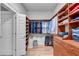 Well-organized walk-in closet with custom built-ins at 221 Oakwood Dr, Cumming, GA 30040