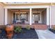 Inviting front porch with rocking chairs and brick flooring at 221 Oakwood Dr, Cumming, GA 30040