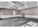 Finished garage with epoxy floor and storage cabinets at 221 Oakwood Dr, Cumming, GA 30040