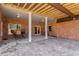 Brick patio with seating area under covered structure at 221 Oakwood Dr, Cumming, GA 30040