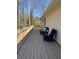 Spacious deck with wooded views, and comfortable seating at 11350 Cranwood Cv, Roswell, GA 30075