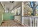 Wooden deck with ceiling fan and white railings at 225 Carlyle Park Ne Dr, Atlanta, GA 30307