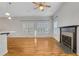 Hardwood floors, fireplace, and plantation shutters in living room at 225 Carlyle Park Ne Dr, Atlanta, GA 30307