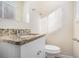 Bathroom with granite vanity and updated fixtures at 2970 Eleanor Nw Ter, Atlanta, GA 30318