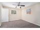 Bedroom with ceiling fan and neutral colored carpet at 2970 Eleanor Nw Ter, Atlanta, GA 30318