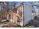 Brick and wood-sided house with carport at 2970 Eleanor Nw Ter, Atlanta, GA 30318