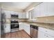 Kitchen with granite countertops and stainless steel appliances at 2970 Eleanor Nw Ter, Atlanta, GA 30318