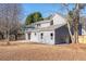 Expansive backyard featuring a patio, complemented by neutral siding for a welcoming outdoor space at 4187 Mistymorn Way, Powder Springs, GA 30127