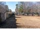 Fenced-in backyard with a well-maintained lawn, perfect for outdoor activities and privacy at 4187 Mistymorn Way, Powder Springs, GA 30127