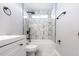 Beautiful bathroom featuring white marble tile and black matte fixtures at 4187 Mistymorn Way, Powder Springs, GA 30127