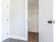 A bedroom showing a closet with white doors at 4187 Mistymorn Way, Powder Springs, GA 30127