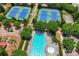 Aerial view showing tennis courts, pool, and playground at 445 Carmichael Cir, Canton, GA 30115