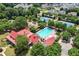 Aerial view of community pool, tennis courts, and clubhouse at 445 Carmichael Cir, Canton, GA 30115