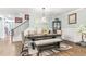 Formal dining room with a large wooden table and bench seating at 445 Carmichael Cir, Canton, GA 30115