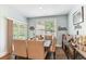Bright dining room with large windows and seating for six at 445 Carmichael Cir, Canton, GA 30115