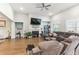 Bright living room with hardwood floors, fireplace and large windows at 445 Carmichael Cir, Canton, GA 30115