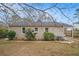 Large backyard with mature trees and ample space at 1903 Meadow Ln, Decatur, GA 30032
