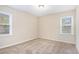 Spacious bedroom with neutral carpeting and natural light at 1903 Meadow Ln, Decatur, GA 30032