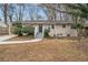 Newly renovated ranch home with a charming front porch and landscaping at 1903 Meadow Ln, Decatur, GA 30032
