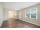Open living area with hardwood floors and neutral walls at 1903 Meadow Ln, Decatur, GA 30032