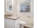 Bathroom with granite vanity and window at 1983 Wee Kirk Se Rd, Atlanta, GA 30316