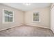 Simple bedroom with neutral walls and carpet at 1983 Wee Kirk Se Rd, Atlanta, GA 30316