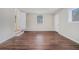 Empty bedroom featuring neutral walls and wood flooring at 1983 Wee Kirk Se Rd, Atlanta, GA 30316