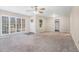 Spacious living room with large windows and neutral carpet at 1983 Wee Kirk Se Rd, Atlanta, GA 30316