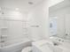 Clean bathroom, bathtub, shower, and vanity with a mirror at 289 Bald Ave, Stockbridge, GA 30253