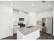 Modern kitchen with granite island and stainless steel appliances at 289 Bald Ave, Stockbridge, GA 30253
