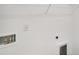 Laundry room with hookups and built-in shelving at 301 White Tail Rd, Stockbridge, GA 30253