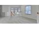 Open loft overlooking main level with carpet, neutral walls and windows at 2700 Pierce Brennen Ct, Lawrenceville, GA 30043