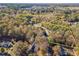 Aerial view of a large lot surrounded by trees at 2612 Country Club Se Dr, Conyers, GA 30013