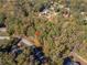 An aerial view of a lot in a wooded neighborhood at 2612 Country Club Se Dr, Conyers, GA 30013