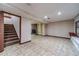 Spacious finished basement with tile floors and fireplace at 2612 Country Club Se Dr, Conyers, GA 30013