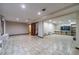 Finished basement with tile floors, recessed lighting, and built-in shelves at 2612 Country Club Se Dr, Conyers, GA 30013