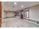 Finished basement featuring a large recreation area and walkout access at 2612 Country Club Se Dr, Conyers, GA 30013