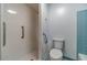 Accessible bathroom with a walk-in shower and grab bars at 2612 Country Club Se Dr, Conyers, GA 30013