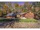 Ranch style home with brick and wood siding at 2612 Country Club Se Dr, Conyers, GA 30013