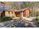 Brick and wood home with covered entryway at 2612 Country Club Se Dr, Conyers, GA 30013