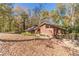 Ranch style home nestled in a wooded setting at 2612 Country Club Se Dr, Conyers, GA 30013