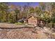 Mid-century modern home with wooded lot at 2612 Country Club Se Dr, Conyers, GA 30013