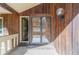 Double front doors with glass panes and brick steps at 2612 Country Club Se Dr, Conyers, GA 30013