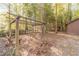 Wooden pergola with swing in backyard at 2612 Country Club Se Dr, Conyers, GA 30013