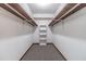 Large walk-in closet with shelving and hanging rods at 2612 Country Club Se Dr, Conyers, GA 30013