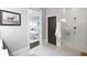 Spa-like bathroom with a walk-in shower and dark wood flooring at 147 Hubbard Rd, Woodstock, GA 30188