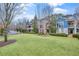 Houses with green lawns and trees at 147 Hubbard Rd, Woodstock, GA 30188