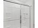 Modern glass-enclosed shower featuring built-in shelving at 3340 Redwood Ct, Covington, GA 30016